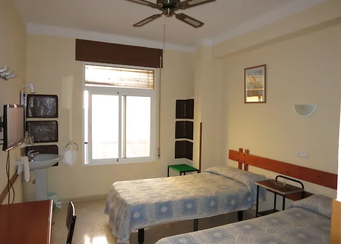 Guillot * 托雷莫利诺斯